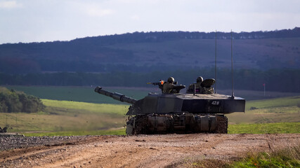 Action shot of a British army Challenger 2 FV4034 Main Battle Tank on a military exercise, Salisbury Plain, UK 