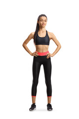 Full length portrait of slim young woman in sportswear