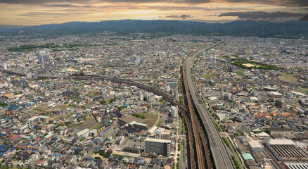 Fototapeta na wymiar Aerial view or bird eyes view images of Kansai bay area Osaka Japan include big premium outlets located across from Kansai International Airport and it's largest airport in western Osaka bay Kansai