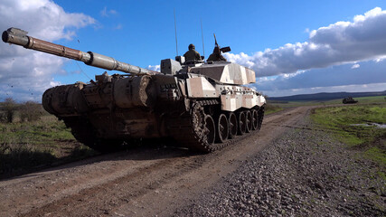British army Challenger 2 ii FV4034 Main Battle Tank on deployment in action on a military battle exercise, Wiltshire UK