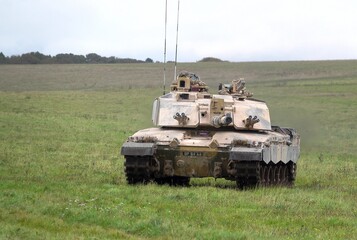 Fototapeta premium British army Challenger 2 ii FV4034 Main Battle Tank on deployment in action on a military battle exercise, Wiltshire UK