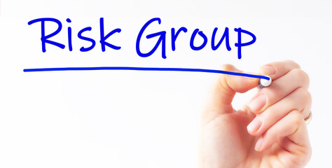 Hand writing inscription RISK GROUP with marker, concept, stock image