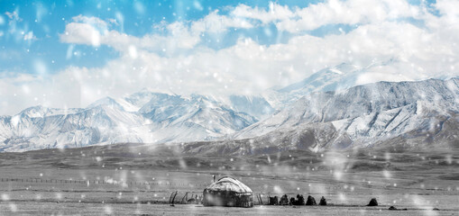 yurt in the snow mongolia on the background of beautiful mountains