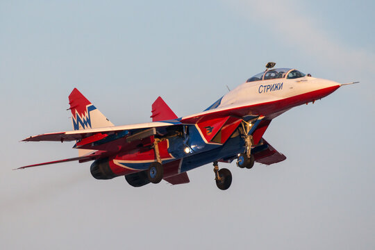 Moscow region, Russia - March, 2015: Russian fighter Mikoyan-Gurevich MiG-29 of an aerobatic demonstration team of the Russian Air Force "Strizhi" (The Swifts) landing at Kubinka air force base.