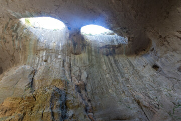Prohodna cave known as God's eyes, Bulgaria