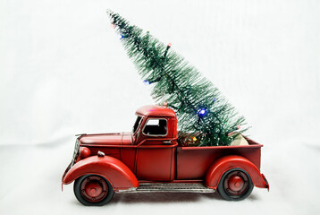 Red Truck and Christmas Tree on White