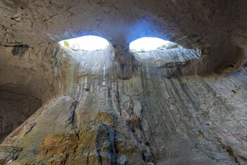Fototapeta na wymiar Prohodna cave known as God's eyes, Bulgaria