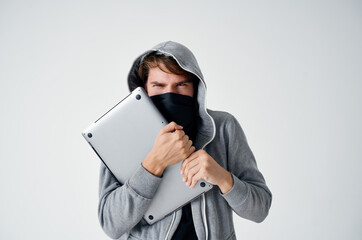 secretive masked man laptop hacker penetration danger