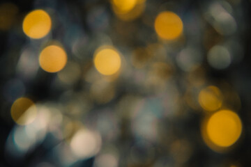 the shine of New Year's lanterns and Christmas tinsel out of focus