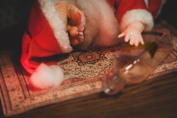 A vintage filtered image of a passed out drunken Santa Claus with dramatic lighting - holiday cheer...