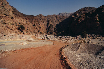 a dirt road in the mountains