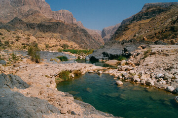 Fototapeta na wymiar a river running through a rocky canyon