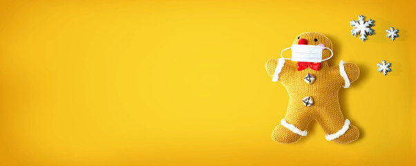 Gingerbread wearing a face mask - flat lay