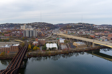 Fototapeta na wymiar Aerial view of Pittsburgh, Pennsylvania's North Side, taken over the Allegheny River near North Shore and Troy Hill.