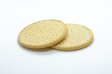Appetizing ruddy wheat cookies on a light background