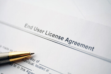 Legal document End User License Agreement on paper close up