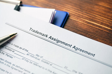 Legal document Trademark Assignment Agreement on paper close up