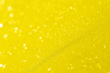 Abstract bokeh background toned with yellow color