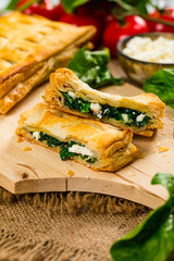 Spinach and Feta Cheese Strudel. Puff Pastry Filled with Spinach and Ricotta Cheese. Selective focus.