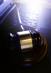 Legal gavel on computer keyboard