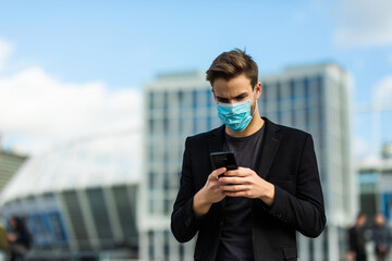 Businessman wear mask walking use phone outside virus protection medicine pandemic quarantine coronavirus crisis