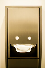 paper towels dispenser looks like a smiley face