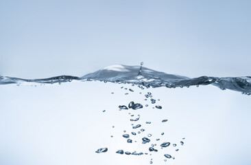 Water splash Aqua flowing in waves and creating bubbles Drops on the water surface feel fresh and...