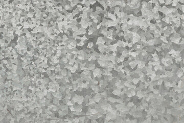 metal grunge background: sheet of rolled metal with scratches and stains, dirt. Toning, close