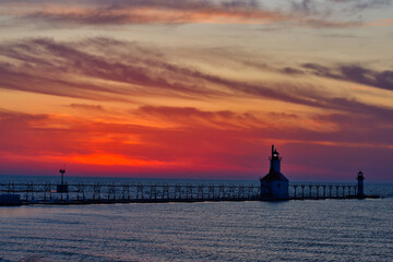 Sunset photo of the St Joseph Michigan North Pier Lighthouses and Lake Michigan