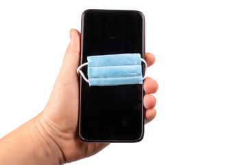 phone in a medical mask on a white background