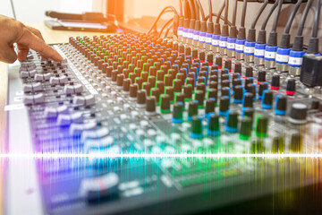 Fototapeta premium Sound recording studio mixing desk with engineer or music producer