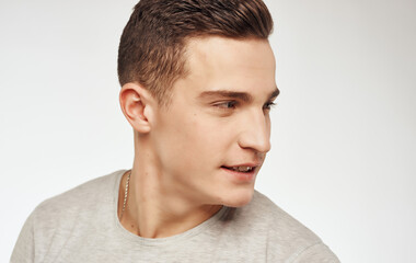 Obraz premium Man in gray t-shirt emotions elegant style their self confidence