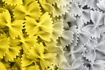 Demonstrating trendy colors 2021 - Gray and Yellow. Cooking pasta concept.