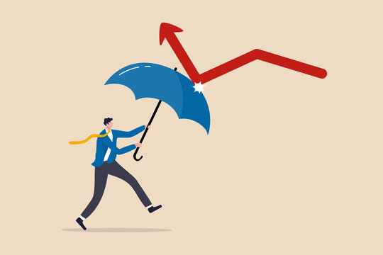 Economic recovery from COVID-19 crisis, business protection or stock market bounce back from recession concept, smart confidence businessman holding strong umbrella to recover red arrow economic graph
