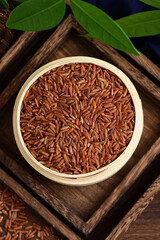 Red Rice on the background of retro Chinese style.