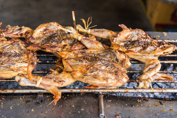 Grilled chicken the favorite food at roadside in Thailand.