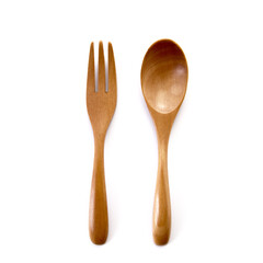 Close up wooden fork and spoon on white