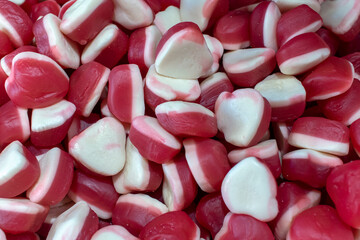 White red heart shaped marmalade. Texture background.