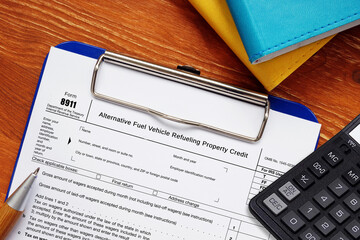  Financial concept about Form 8911 Alternative Fuel Vehicle Refueling Property Credit with inscription on the piece of paper.