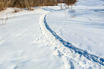 Obraz premium Shadows on the snowy surface