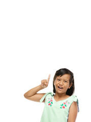 Asian cute girl presenting something on hand over white background