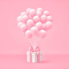 White gift box with pink bow and balloons on pink background