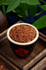 Red Rice on the background of retro Chinese style. The Chinese meaning in the picture is happiness
