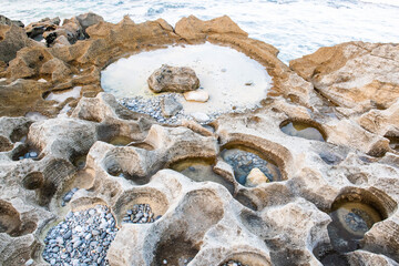 Rocky sandstone outcrops along the Arniston coastline