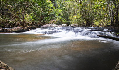 Natural waterfall and lake landscape in national park in Thailand