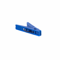 Blue plastic clothespin isolated on a white background