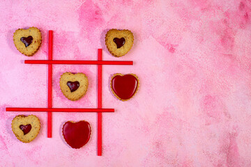 Linzer cookie game in TIC-TAC-toe.