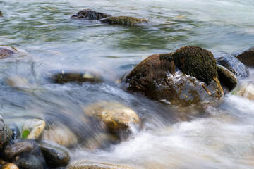 Rocky stream running water of mountain river