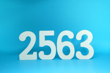 2563 number wooden object on Blue background and copy space - Happy new year 2563 , Chinese new year - Blue concept - Thai Year