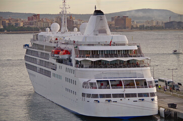 Luxury Silversea cruiseship or cruise ship liner yacht in port of Palma de Mallorca with distant...